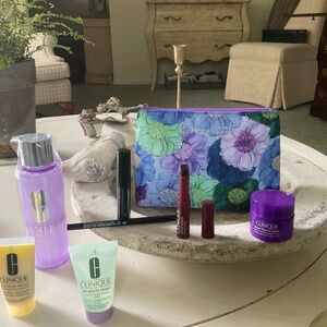 Clinique cosmetic bag with Full size Take the day Off.